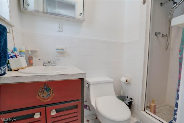 1701 19th Ave, Parkersburg, WV 26101 - bathroom with a stall shower, tile walls, and vanity