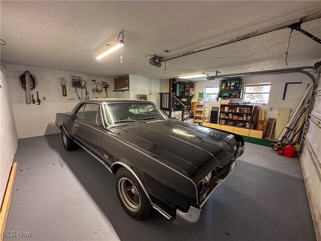 1701 19th Ave, Parkersburg, WV 26101 - garage featuring a garage door opener