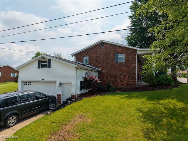 1701 19th Ave, Parkersburg, WV 26101 - view of side of property with a garage, a yard, and brick siding