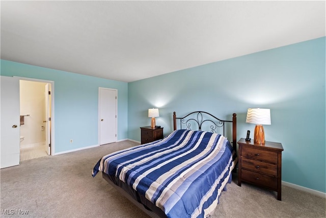 2112 Acacia Park Dr Unit 524, Lyndhurst, OH 44124 - carpeted bedroom with baseboards and ensuite bathroom