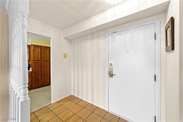 2112 Acacia Park Dr Unit 524, Lyndhurst, OH 44124 - foyer entrance with light tile patterned floors and baseboards