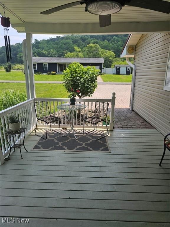 7261 Austin Dr, Mcconnelsville, OH 43756 - wooden terrace with a ceiling fan and a lawn