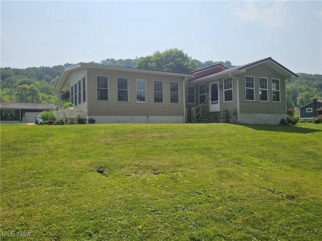 7261 Austin Dr, Mcconnelsville, OH 43756 - back of house with a yard and entry steps