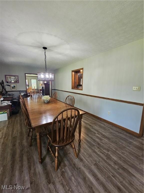 7261 Austin Dr, Mcconnelsville, OH 43756 - dining space featuring wood finished floors and a chandelier