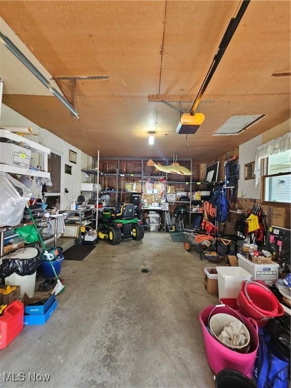 7261 Austin Dr, Mcconnelsville, OH 43756 - garage with a garage door opener