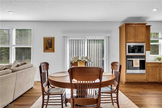 23200 St Andrews Dr, Columbia Station, OH 44028 - dining area with light wood finished floors and recessed lighting