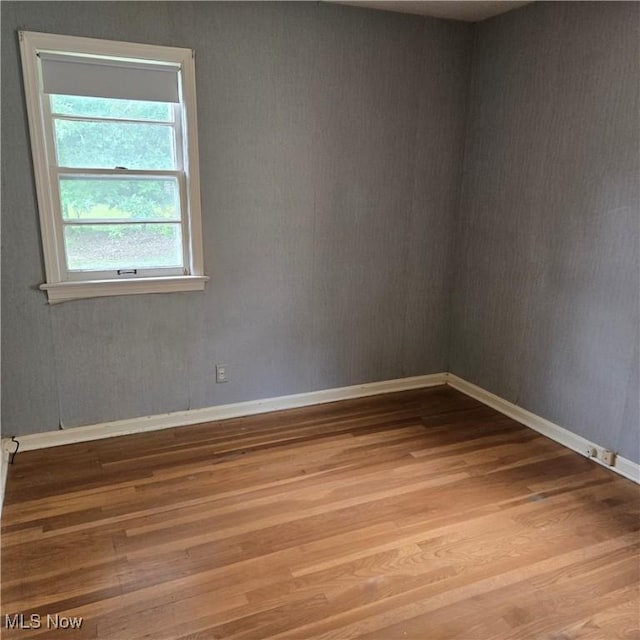 331 E 264th St, Euclid, OH 44132 - spare room featuring wood finished floors and baseboards