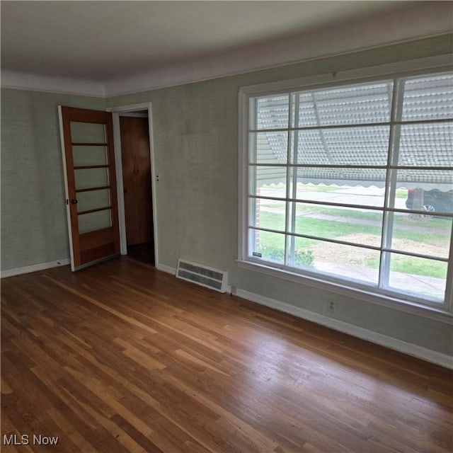 331 E 264th St, Euclid, OH 44132 - spare room with baseboards and dark wood finished floors