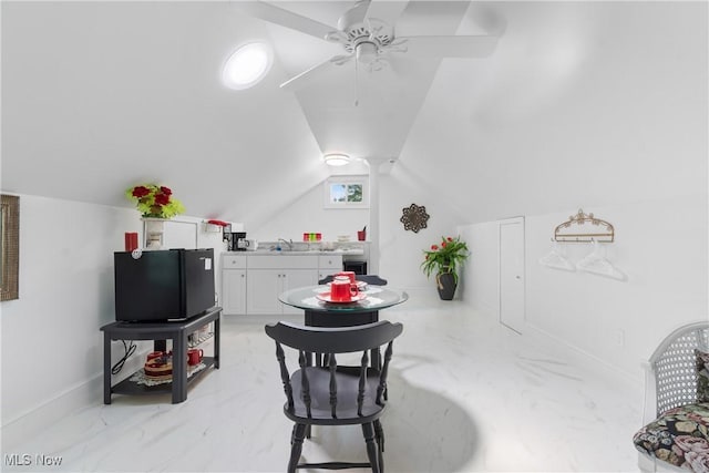 14203 Hatfield Rd, Rittman, OH 44270 - dining room featuring a ceiling fan and vaulted ceiling