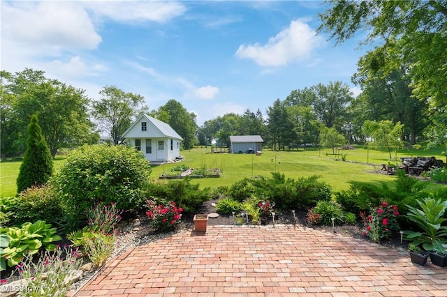 14203 Hatfield Rd, Rittman, OH 44270 - view of patio featuring an outdoor structure and view of scattered trees