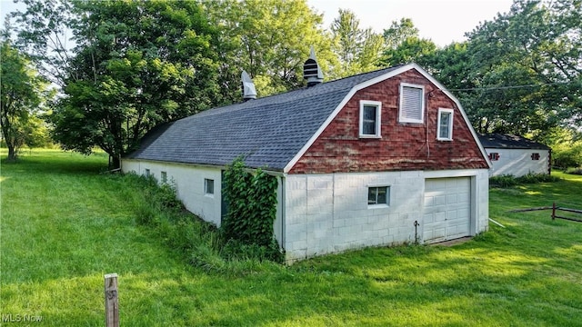 2335 Southway St SW, Massillon, OH 44646 - view of barn with a lawn and view of wooded area