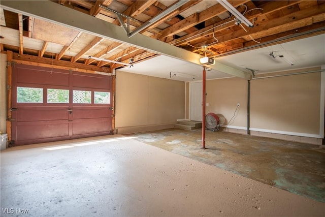 809 Mcdaniel Ave, Minerva, OH 44657 - garage featuring a garage door opener