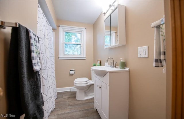 809 Mcdaniel Ave, Minerva, OH 44657 - bathroom featuring vanity and wood finished floors