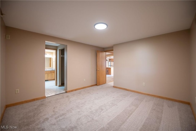 809 Mcdaniel Ave, Minerva, OH 44657 - spare room featuring light carpet