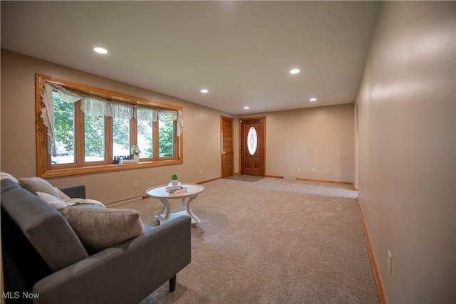 809 Mcdaniel Ave, Minerva, OH 44657 - living room with recessed lighting, light colored carpet, and a baseboard heating unit