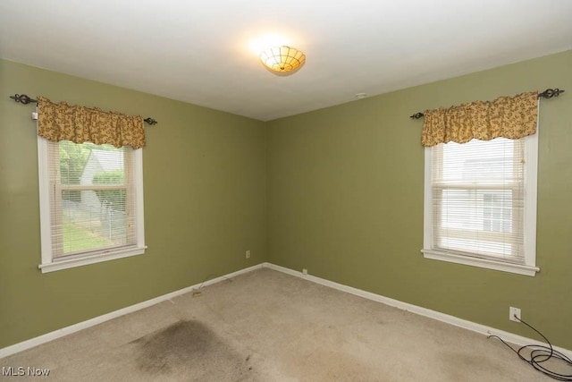 1114 W Miner Rd, Mayfield Heights, OH 44124 - empty room featuring light colored carpet and baseboards