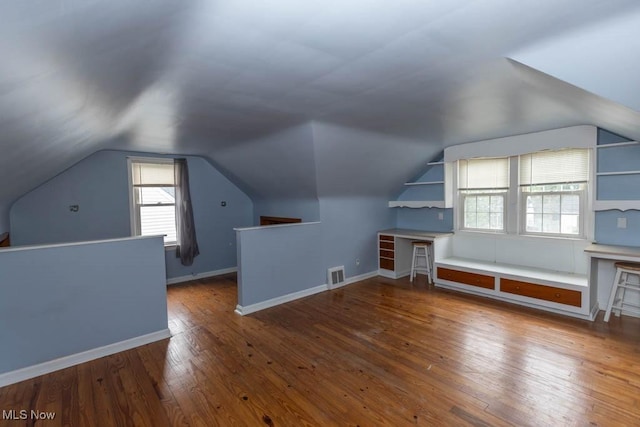 1114 W Miner Rd, Mayfield Heights, OH 44124 - bonus room with wood-type flooring and lofted ceiling