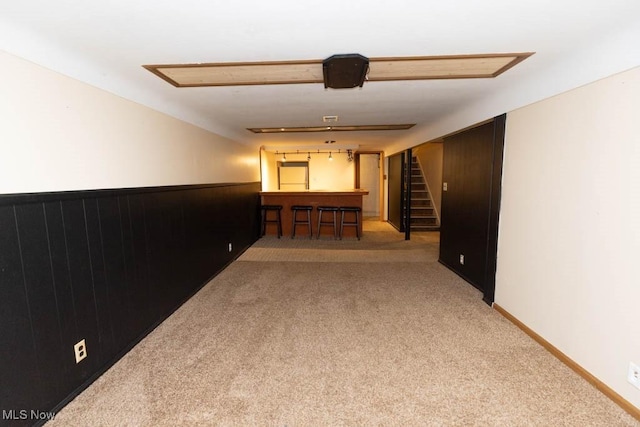 1114 W Miner Rd, Mayfield Heights, OH 44124 - hall with carpet floors, attic access, and a wainscoted wall