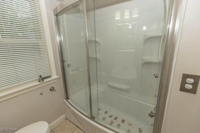 1114 W Miner Rd, Mayfield Heights, OH 44124 - bathroom with a stall shower and tile patterned floors
