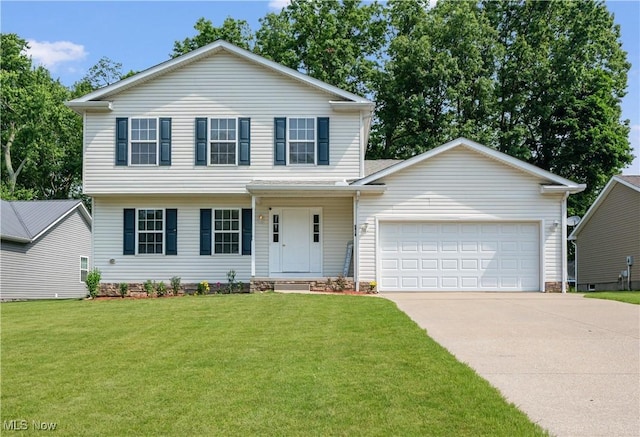 2919 Pepper Hill Cir, Akron, OH 44312 - view of front of house with concrete driveway, a garage, and a front lawn