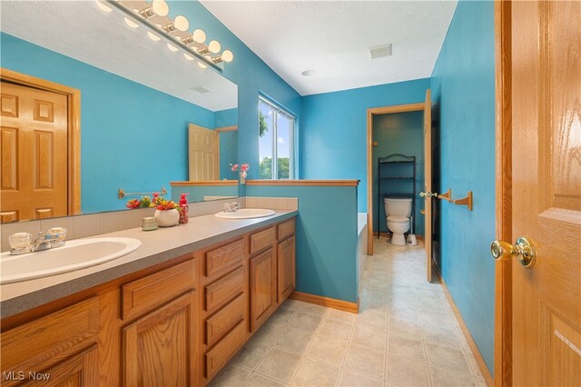 2919 Pepper Hill Cir, Akron, OH 44312 - bathroom featuring double vanity and tile patterned floors