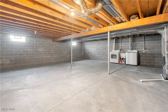 2919 Pepper Hill Cir, Akron, OH 44312 - basement featuring washer and dryer and a sink