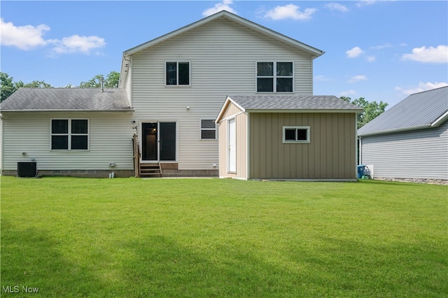 2919 Pepper Hill Cir, Akron, OH 44312 - rear view of house featuring entry steps, roof with shingles, and a yard