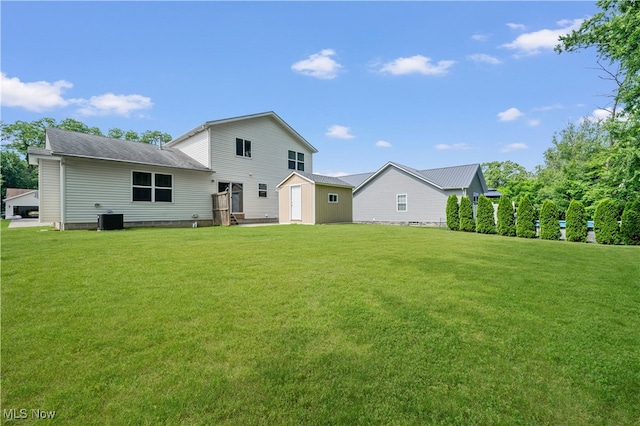 2919 Pepper Hill Cir, Akron, OH 44312 - back of house with a yard and a shed