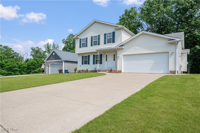 2919 Pepper Hill Cir, Akron, OH 44312 - view of front of home featuring a front yard, a garage, and driveway