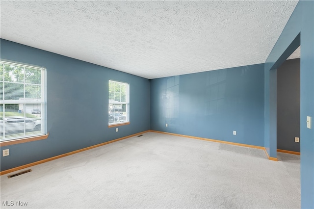 2919 Pepper Hill Cir, Akron, OH 44312 - empty room with carpet and a textured ceiling