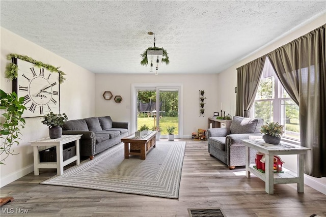 59301 Honeybee Rd, Senecaville, OH 43780 - living room with a textured ceiling and wood finished floors