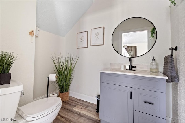59301 Honeybee Rd, Senecaville, OH 43780 - half bathroom featuring vanity and wood finished floors