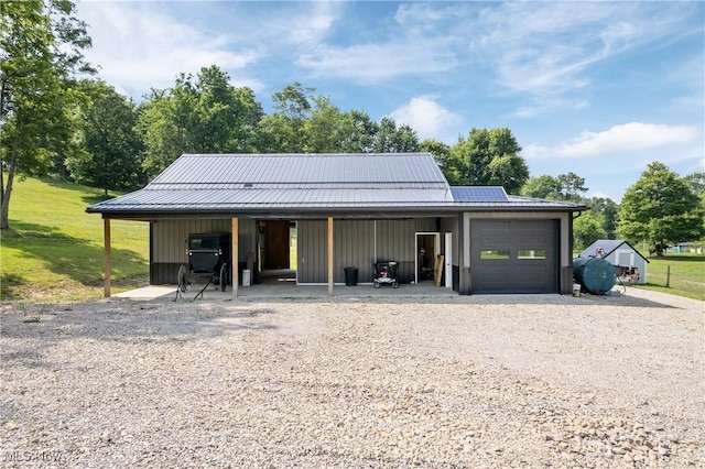 59301 Honeybee Rd, Senecaville, OH 43780 - garage featuring gravel driveway and solar panels