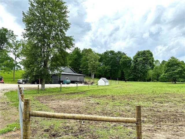 59301 Honeybee Rd, Senecaville, OH 43780 - view of yard with driveway, a rural view, and a shed