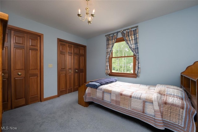 1015 Cambridge Ct NE, Warren, OH 44484 - bedroom featuring a chandelier, carpet floors, and a closet