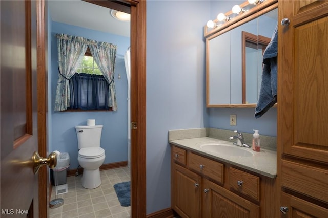 1015 Cambridge Ct NE, Warren, OH 44484 - bathroom featuring vanity and toilet
