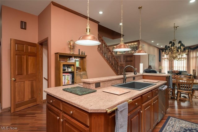 1015 Cambridge Ct NE, Warren, OH 44484 - kitchen with dark wood-type flooring, open floor plan, a chandelier, light countertops, and recessed lighting