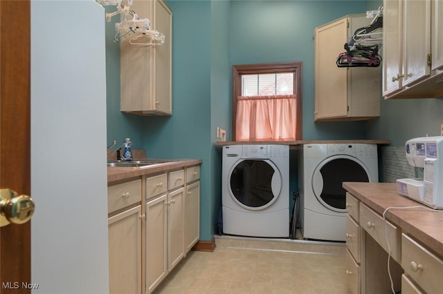 1015 Cambridge Ct NE, Warren, OH 44484 - laundry room featuring cabinet space and washer and clothes dryer