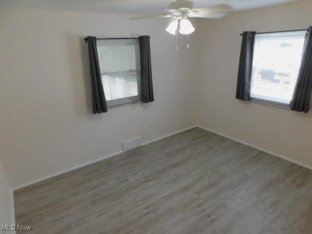 4139 W 144th St, Cleveland, OH 44135 - empty room featuring wood finished floors and ceiling fan