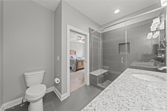 1335 W Clifton Blvd, Lakewood, OH 44107 - ensuite bathroom featuring a shower stall, tile patterned floors, a ceiling fan, and double vanity