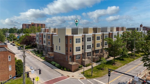 1335 W Clifton Blvd, Lakewood, OH 44107 - view of property featuring uncovered parking
