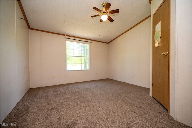 2500 Mcclintocksburg Rd, Deerfield, OH 44411 - spare room with carpet flooring, crown molding, lofted ceiling, ceiling fan, and a textured ceiling