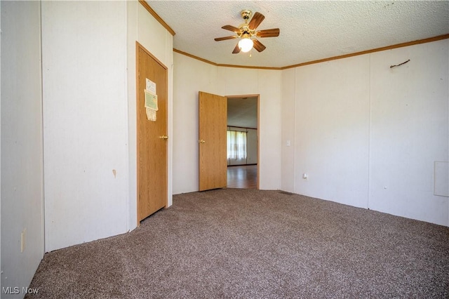 2500 Mcclintocksburg Rd, Deerfield, OH 44411 - empty room with carpet floors, ceiling fan, ornamental molding, and a textured ceiling