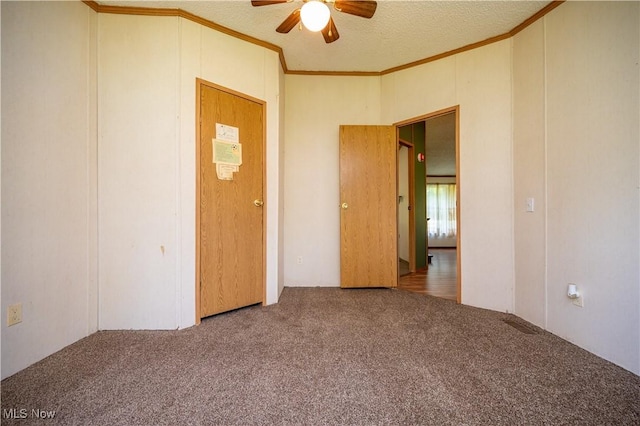 2500 Mcclintocksburg Rd, Deerfield, OH 44411 - spare room with carpet flooring, a ceiling fan, ornamental molding, and a textured ceiling