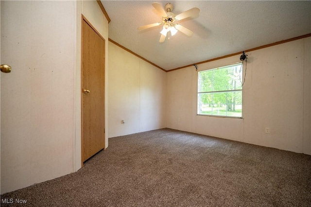 2500 Mcclintocksburg Rd, Deerfield, OH 44411 - unfurnished room with carpet flooring, ornamental molding, a ceiling fan, a textured ceiling, and lofted ceiling