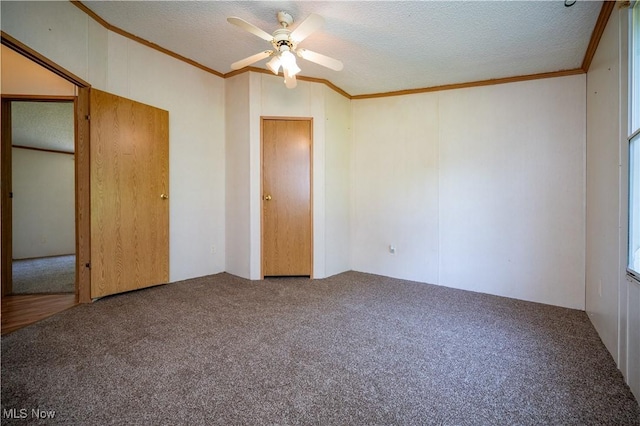 2500 Mcclintocksburg Rd, Deerfield, OH 44411 - unfurnished bedroom featuring carpet, ornamental molding, a textured ceiling, and a ceiling fan