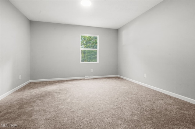 4232 Wilson Rd, Ravenna, OH 44266 - carpeted empty room featuring baseboards