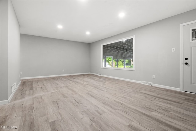 4232 Wilson Rd, Ravenna, OH 44266 - empty room featuring wood finished floors and recessed lighting