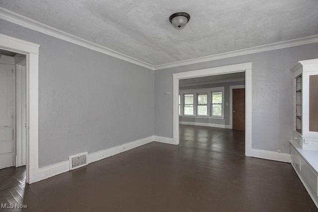 11515 Hopkins Ave, Cleveland, OH 44108 - empty room featuring dark wood finished floors, crown molding, and a textured ceiling