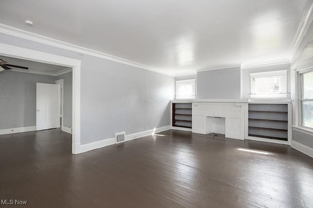 11515 Hopkins Ave, Cleveland, OH 44108 - unfurnished living room featuring plenty of natural light, wood finished floors, ornamental molding, ceiling fan, and a brick fireplace